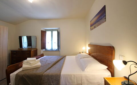 Apuane Retreat: Furniture, Property, Mirror, Comfort, Light, Building, Lighting, Textile, Wood, Window