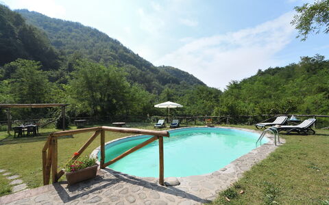 Casa Antelminelli: Water, Sky, Cloud, Plant, Water Resources, Swimming Pool, Mountain, Natural Landscape, Tree, Outdoor Furniture