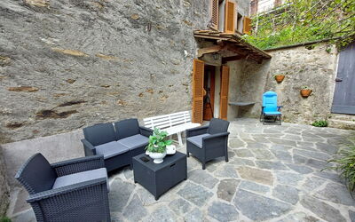 Casa Le Grotte: Plant, Building, Window, Flowerpot, Houseplant, Couch, Architecture, Outdoor Furniture, Road Surface, House