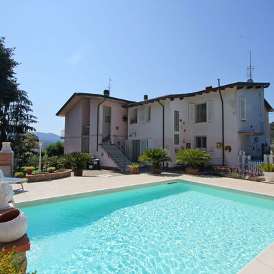 Casa Luigi: Water, Plant, Sky, Property, Building, Swimming Pool, Azure, Grass, Tree, Leisure