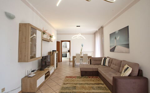 Appartamento Levante: Picture Frame, Property, Furniture, Couch, Lighting, Interior Design, Living Room, Floor, Wood, Flooring