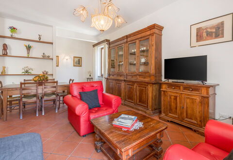Cascine Apartment In Florence: Furniture, Interior Design, Flooring, Wood, Room, Floor, Ceiling, Living Room, Cabinetry, Lighting