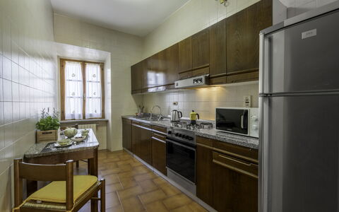 Casa Martina, Piazza Delle Erbe, San Gimignano: Kitchen, Kitchen Appliance, Countertop, Major Appliance, Flooring, Interior Design, Cabinetry, Wood, Ceiling, Furniture