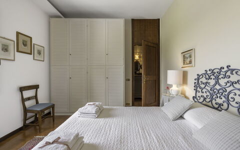 Casa Martina, Piazza Delle Erbe, San Gimignano: Bed, Furniture, Bedroom, Interior Design, Bedding, Bed Sheet, Flooring, Floor, Wood, Room