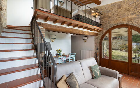 Villa Ida: Property, Couch, Building, Window, Wood, Interior Design, Stairs, Floor, Living Room, House