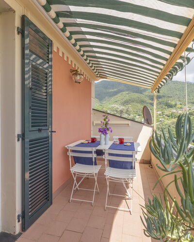 Emma House, Terrace and Sea View, Moneglia: Table, Plant, Furniture, Building, Chair, Shade, Cloud, Houseplant, Outdoor Furniture, Architecture