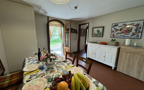 Pinocchio: Furniture, Property, Cabinetry, Banana, Table, Interior Design, Wood, Picture Frame, Lighting