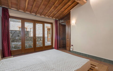 Casolare Torre With Pool And Ac: Wall, Flooring, Wood, Floor, Interior Design, Ceiling, Room, Bedroom, Brown, Bed