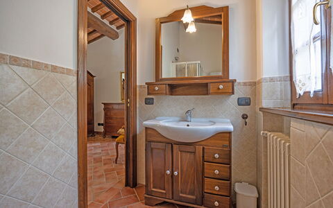 La Montanina: Mirror, Brown, Bathroom Cabinet, Tap, Sink, Cabinetry, Bathroom Sink, Plumbing Fixture, Property, Bathroom