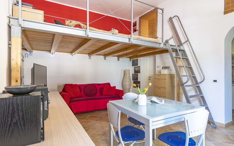 Florentine Careggi Loft: Table, Furniture, Property, Couch, Wood, Building, Interior Design, Floor, Flooring, Comfort