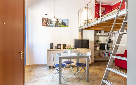 Florentine Careggi Loft: Table, Property, Furniture, Bookcase, Picture Frame, Building, Desk, Wood, Interior Design, Shelving