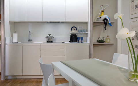 Boheme With Beach & Breakfast Included: Property, Furniture, Cabinetry, White, Table, Interior Design, Plant, Shelving, Flower