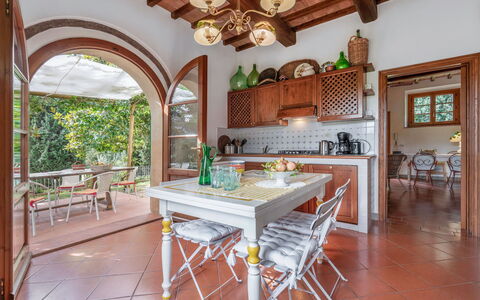 La Tesa Country House With Pool S. Gimignano: Table, Furniture, Wood, Countertop, Chair, Kitchen, Interior Design, Wood Stain, Flooring, Floor