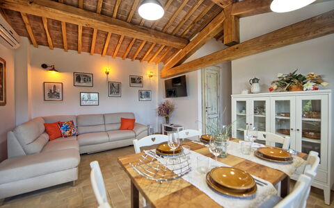 Casa Andrea: Table, Furniture, Property, Picture Frame, Couch, Tableware, Wood, Interior Design, Orange, Living Room