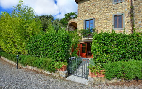 Casa Minuccia: Plant, Cloud, Window, Building, Sky, Grass, Residential Area, House, Shrub, Facade
