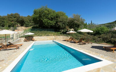 Casa Minuccia: Water, Property, Plant, Furniture, Sky, Swimming Pool, Azure, Shade, Chair, Outdoor Furniture