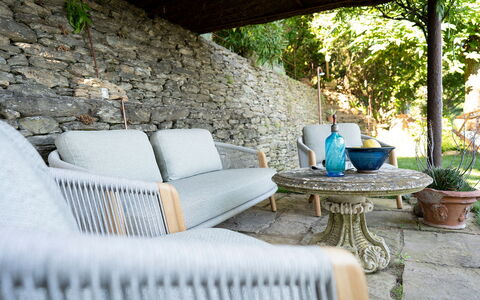 La Casa Sul Forte: Plant, Property, Furniture, Table, Couch, Outdoor Furniture, Interior Design, Living Room, Grass