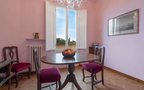 Orto Botanico Apartment With Terrace And Dome View: Table, Furniture, Property, Chair, Picture Frame, Plant, Wood, Interior Design, Lighting, Houseplant