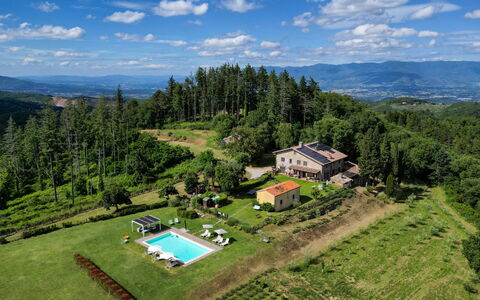 Montelucci Chianti Agrivilla: Cloud, Sky, Plant, Property, Mountain, Blue, Natural Landscape, Tree, Land Lot, House