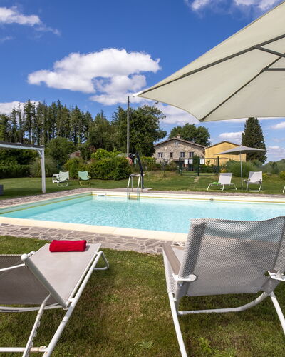 Montelucci Chianti Agrivilla: Water, Cloud, Sky, Furniture, Property, Swimming Pool, Building, Shade, Plant, Outdoor Furniture