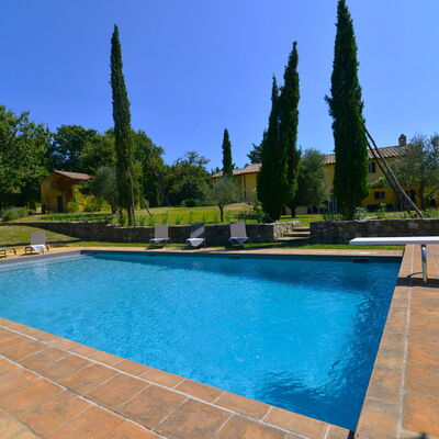 Villa Il Troscione: Blue, Swimming Pool, Shade, Garden, Landscaping, Resort, Outdoor Furniture, Water Feature, Hacienda, Backyard