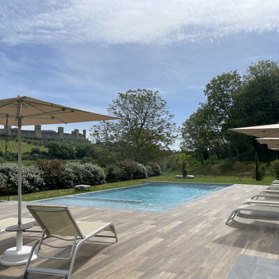Le Torri, Borgo Campassini, Monteriggioni: Swimming Pool, Outdoor Furniture, Furniture, Sunlounger, Chair, Composite Material, Shade, Garden, Resort, Umbrella