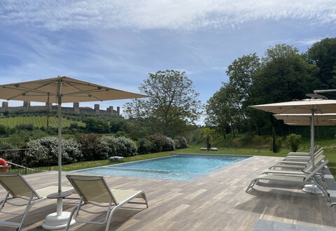 La Piazzetta, Borgo Campassini, Monteriggioni: Swimming Pool, Outdoor Furniture, Furniture, Sunlounger, Chair, Composite Material, Shade, Garden, Resort, Umbrella