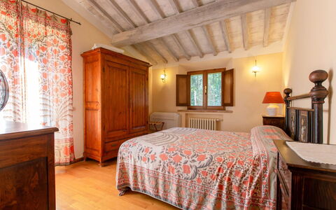 Villa la Felce: Bed, Furniture, Bedroom, Interior Design, Bedding, Bed Sheet, Wall, Wood, Ceiling, Linens