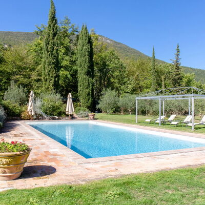 Villa la Felce: Swimming Pool, Resort, Garden, Landscaping, Eco Hotel, Outdoor Furniture, Water Feature, Leisure, Flagstone, Shade