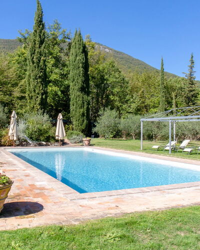 Villa la Felce: Swimming Pool, Resort, Garden, Landscaping, Eco Hotel, Outdoor Furniture, Water Feature, Leisure, Flagstone, Shade