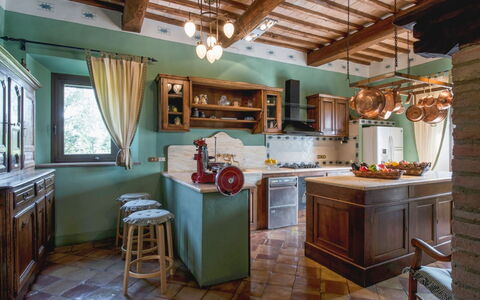 Villa Giuncheto: Furniture, Interior Design, Flooring, Kitchen, Wood, Ceiling, Cabinetry, Room, Floor, Light Fixture