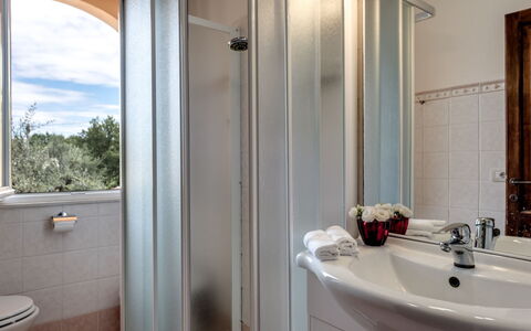 Bellaria: Interior Design, Flooring, Room, Furniture, Floor, Ceiling, Home, Plumbing Fixture, Bed, Bedroom