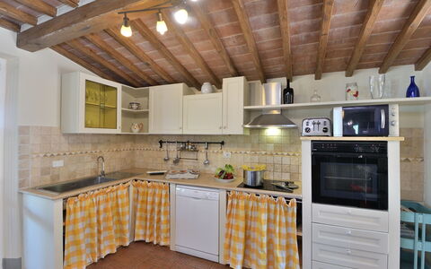 Bellaria: Kitchen, Furniture, Countertop, Kitchen Appliance, Interior Design, Flooring, Major Appliance, Wood, Cabinetry, Ceiling