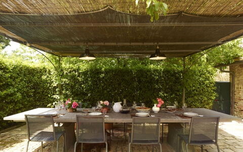 Villa del Riccio: Furniture, Table, Outdoor Furniture, Chair, Outdoor Table, Kitchen & Dining Room Table, Shade, Backyard, Garden, Outdoor Structure