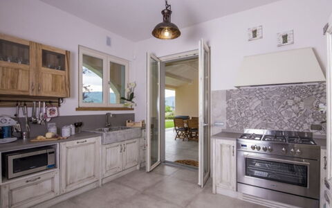 Villa Sara: Kitchen, Countertop, Flooring, Furniture, Interior Design, Cabinetry, Floor, Kitchen Appliance, Home, Home Appliance