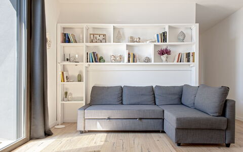 Vistamare: Furniture, Flooring, Wood, Couch, Floor, Interior Design, Living Room, Wood Flooring, Room