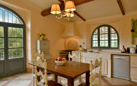Villa Ginevra: Furniture, Interior Design, Flooring, Wood, Floor, Ceiling, Light Fixture, Kitchen, Chair, Lighting