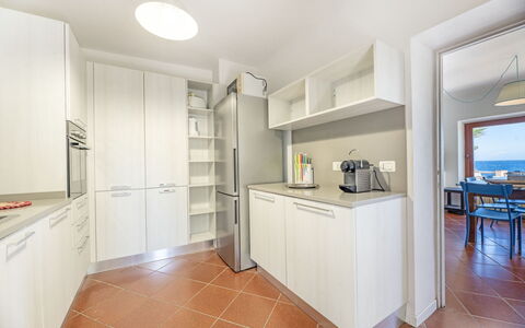 Villa Marciana: Kitchen, Interior Design, Kitchen Appliance, Flooring, Major Appliance, Ceiling, Floor, Countertop, Cabinetry, Room