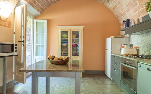 Villa Linchiano: Furniture, Interior Design, Flooring, Wall, Wood, Ceiling, Kitchen, Floor, Countertop, Chair