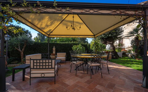 Ely Apartment In Villa, Wifi, Terricciola, Pisa: Flooring, Shade, Outdoor Structure, Garden, Flowerpot, Gazebo, Pavilion, Flagstone, Outdoor Furniture, Patio