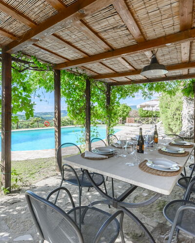 Villa Poggio La Croce: Furniture, Outdoor Furniture, Chair, Swimming Pool, Outdoor Table, Resort, Flagstone, Eco Hotel, Shade, Kitchen & Dining Room Table