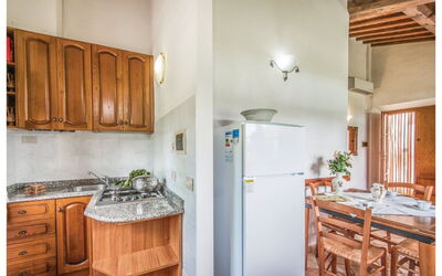 Granaio: Flooring, Interior Design, Floor, Major Appliance, Kitchen Appliance, Room, Apartment, Kitchen, Ceiling, Wood Stain