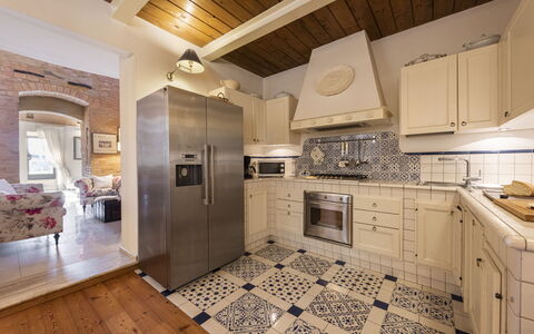 Villa Zambra: Kitchen, Flooring, Interior Design, Floor, Countertop, Kitchen Appliance, Furniture, Major Appliance, Wood, Cabinetry