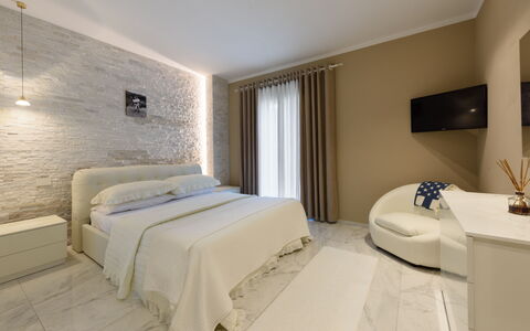 Villa Fiumetto: Furniture, Interior Design, Wall, Flooring, Floor, Bed, Bedroom, Wood, Ceiling, Room