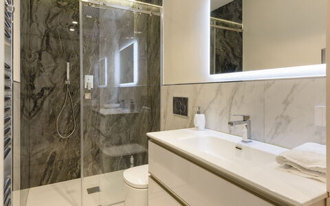 Villa Fiumetto: Flooring, Floor, Plumbing Fixture, Interior Design, Bathroom, Mirror, Bathroom Cabinet, Bathroom Sink, Plumbing, Tap