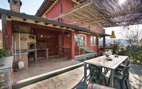 Villa Camaiore: Furniture, Chair, Home, Porch, Cottage, Shade, Kitchen & Dining Room Table, Wood Stain, Outdoor Furniture, Flowerpot