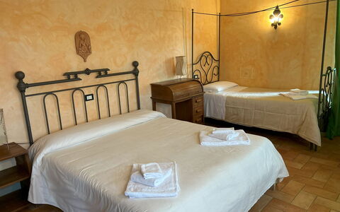 Appartamento Il Cantico Del Gallo, Wifi, Near Peru: Furniture, Flooring, Floor, Interior Design, Bed, Bedroom, Bed Frame, Chair, Bedding, Light Fixture