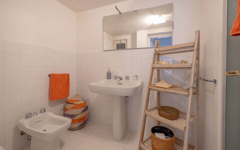 Villa Argentina: Toilet Seat, Bathroom, Plumbing Fixture, Flooring, Floor, Toilet, Interior Design, Bathroom Sink, Plumbing, Sink