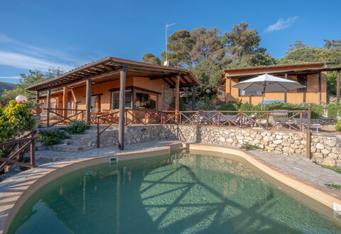 Villa Argentina: Swimming Pool, Resort, Eco Hotel, Shade, Landscaping, Water Feature, Estate, Outdoor Structure, Flagstone, Outdoor Furniture