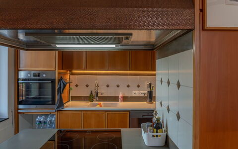 Ca' Nelly: Kitchen, Interior Design, Wood, Countertop, Ceiling, Flooring, Kitchen Appliance, Cabinetry, Lighting, Major Appliance